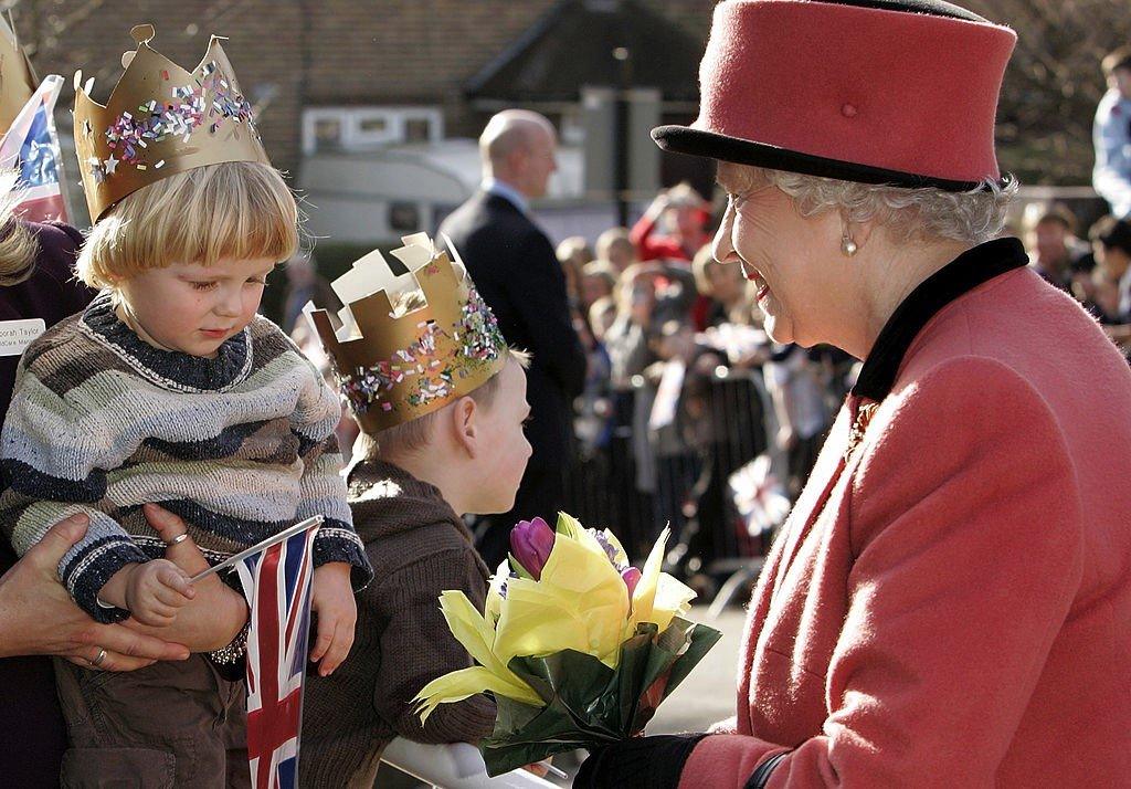 The Queen meeting a young boy