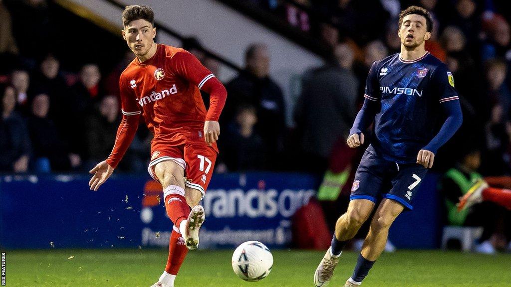 Walsall's Jack Earing passes the ball