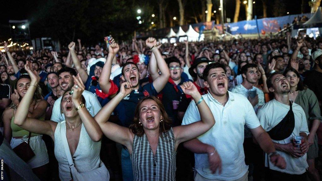 Fans in Toulouse celebrate France's win