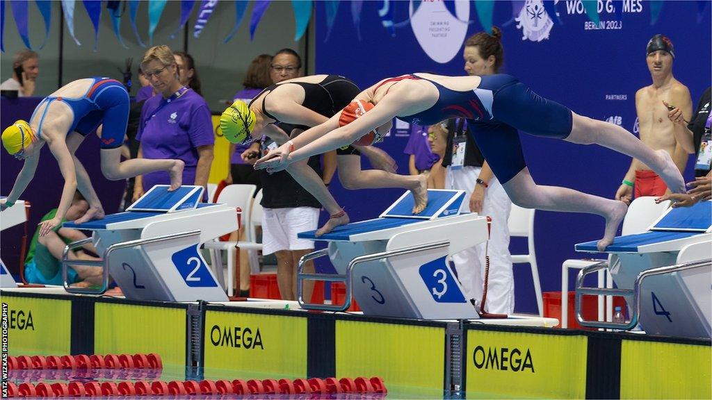 Taylor Mackenzie diving into the swimming pool in the Special Olympics World Games on Berlin