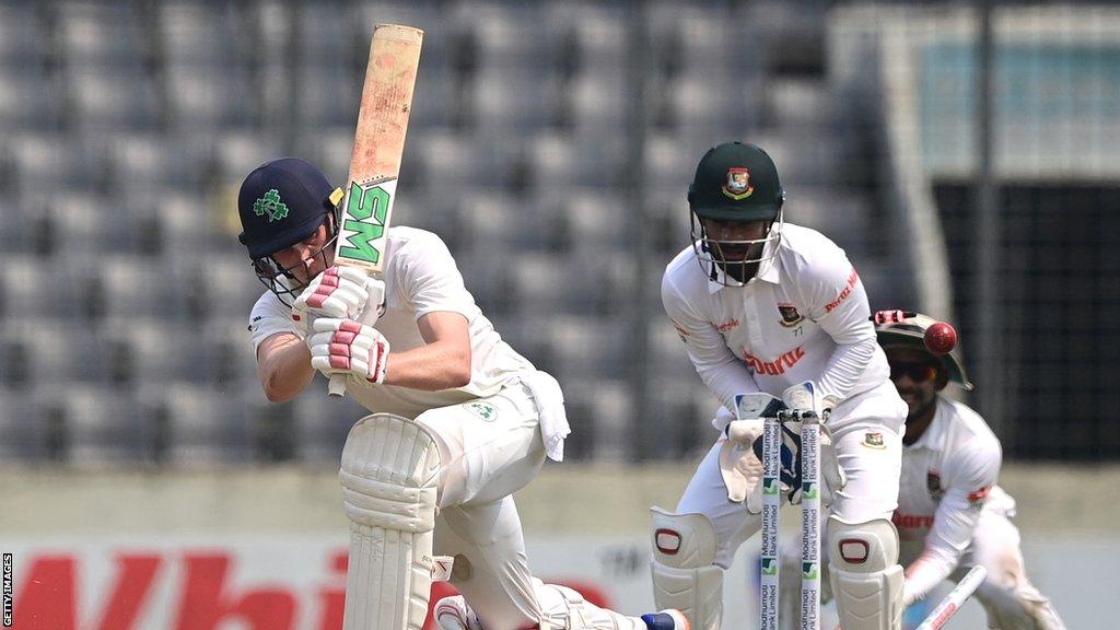 Ireland's Harry Tector is cleaned bowled by Mehidy Hasan after making 50 on the first day of the Test match