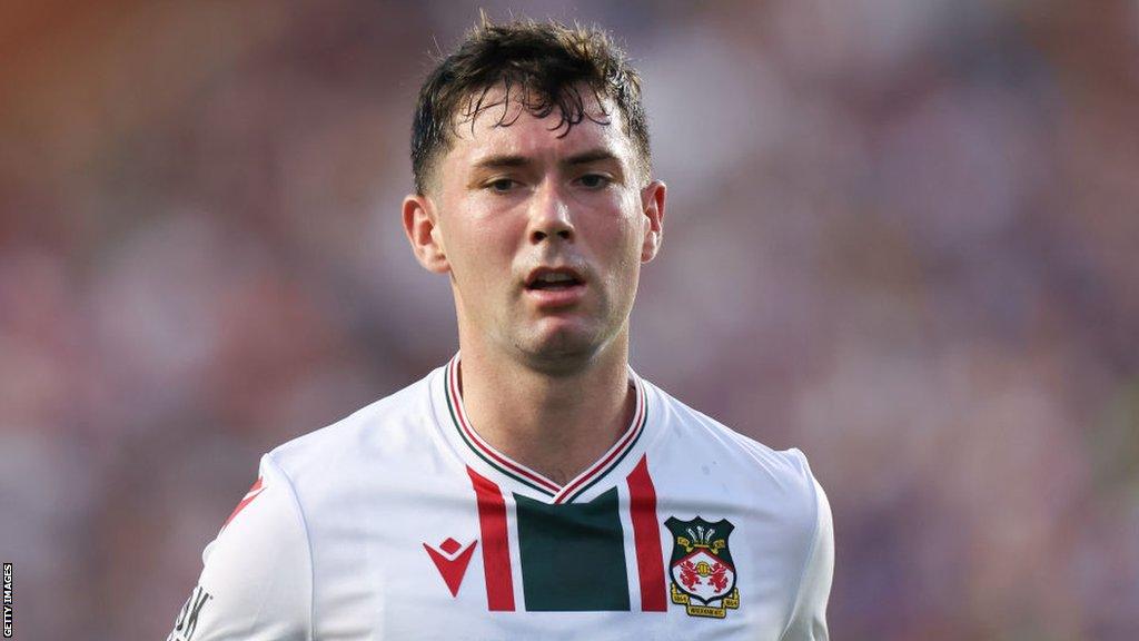 Wrexham midfielder Tom O'Connor in action during pre-season