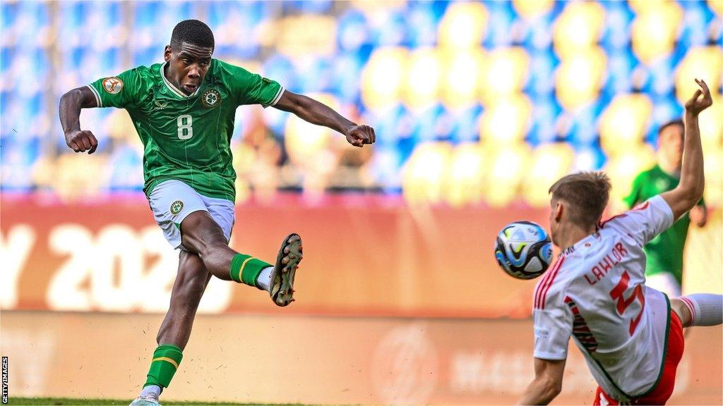 Romeo Akachukwu scores the Republic of Ireland's third goal against Wales.