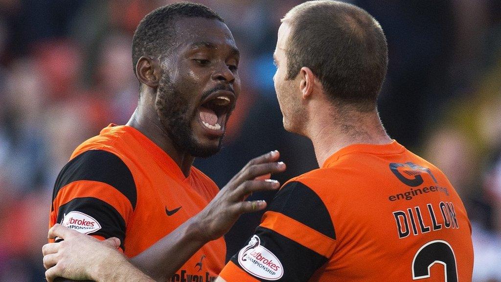 Wato Kuate argues with Dundee United captain Sean Dillon