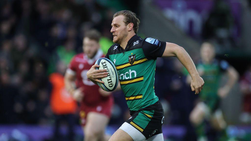 Northampton Saints scrum-half Callum Braley carries the ball