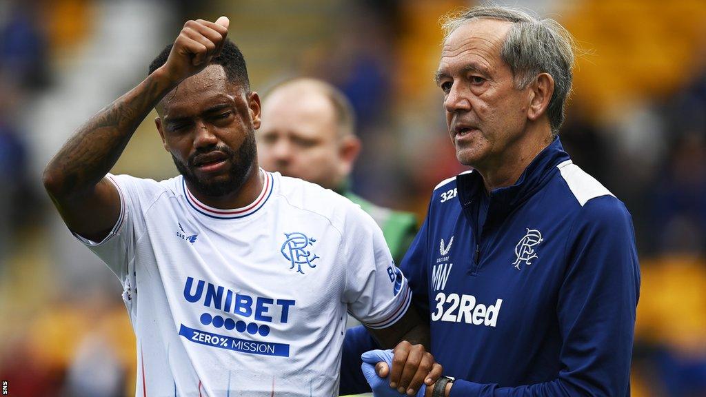 Rangers forward Danilo with a member of the club's medical staff