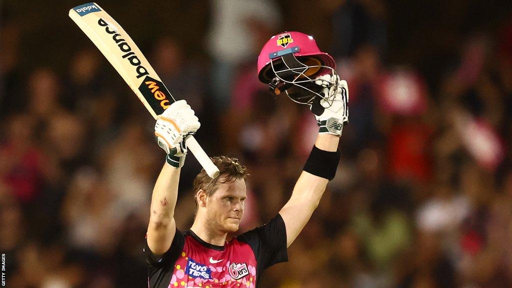 Steve Smith celebrates reaching a century in the Big Bash League