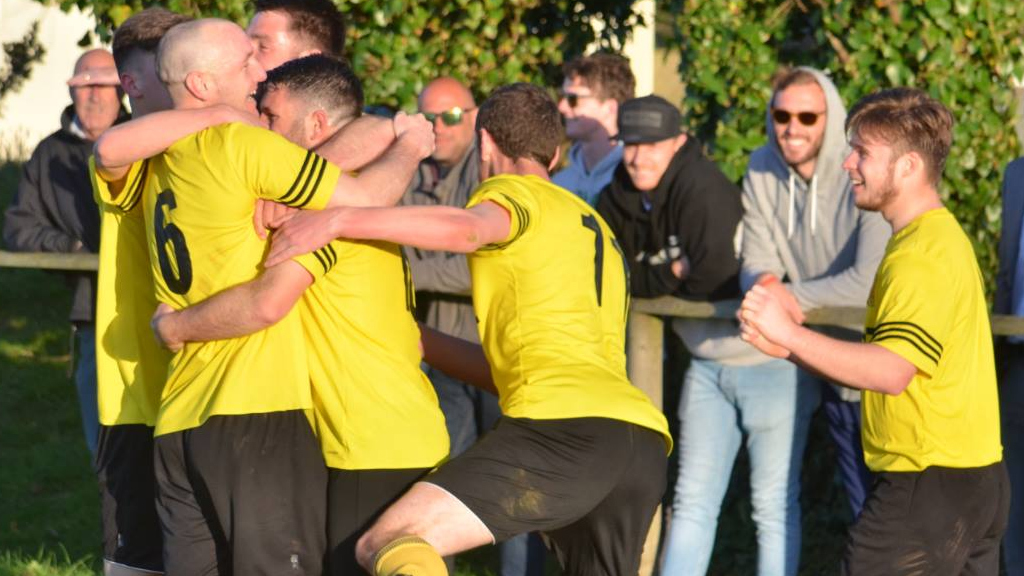 Luke Watson celebrates his opener