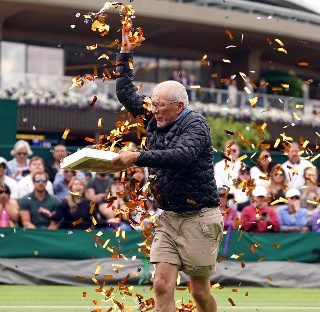 The third protester interrupted play on court 18 again