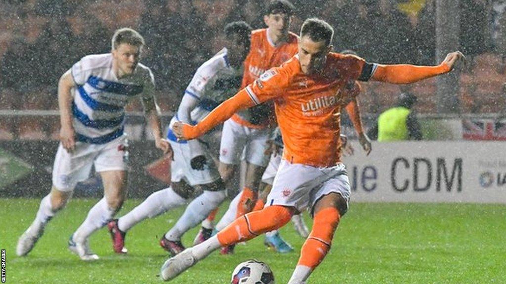 Blackpool's Jerry Yates scores from the spot