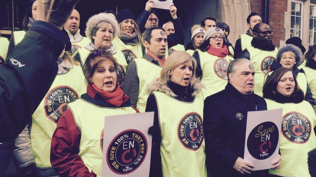 Striking ENO choirsters singing outside the Arts Council England offices