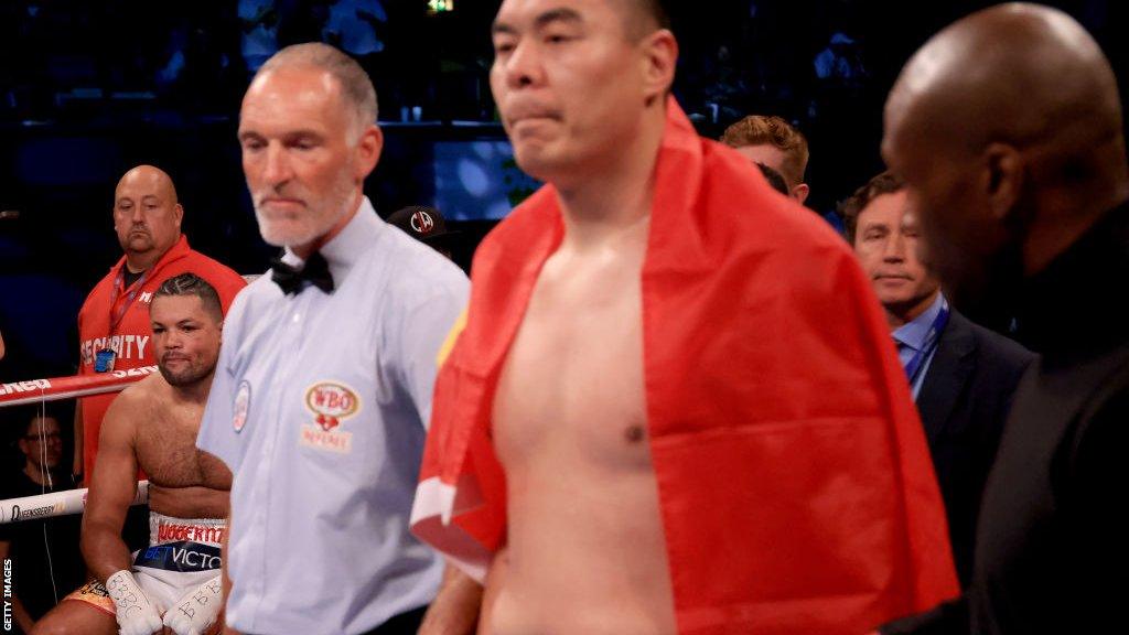 Joe Joyce sits on his stool as Zhilei Zhang is declared the winner