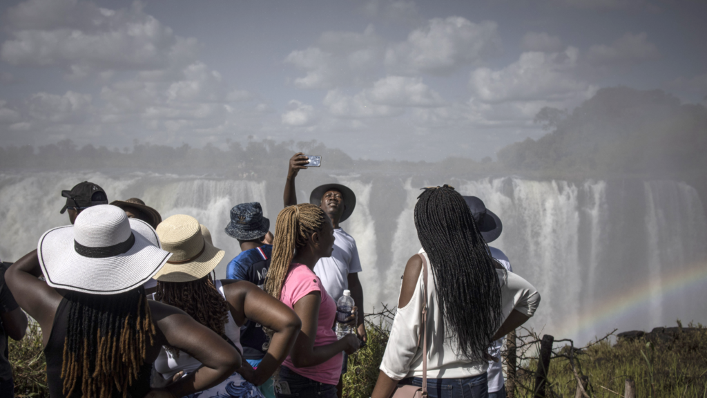 People visiting Victoria Falls in Zimbabwe, December 2022