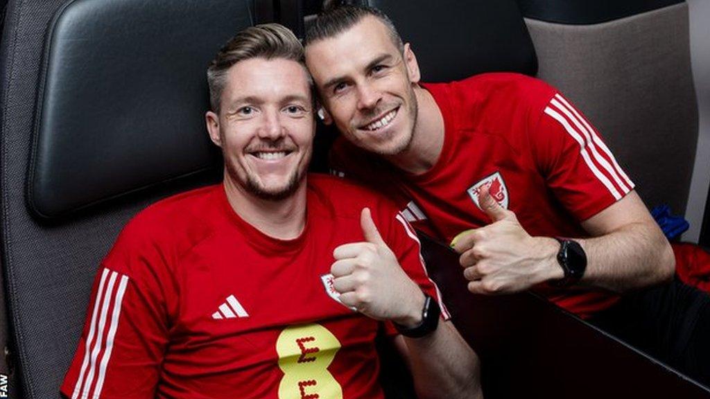 Wayne Hennessey and Gareth Bale on the plane to Qatar