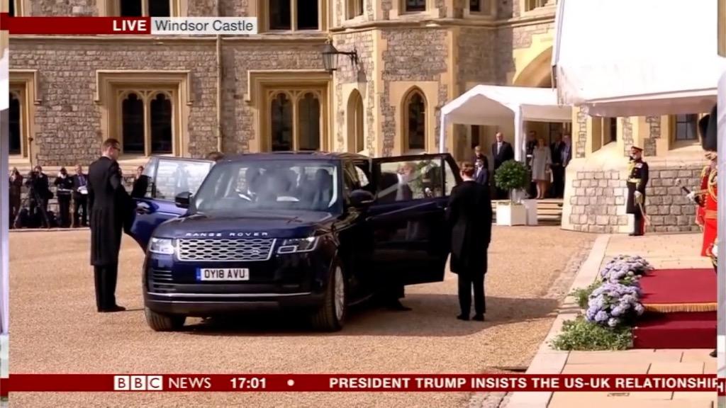 Screenshot of President Trump getting out of a car before meeting the Queen