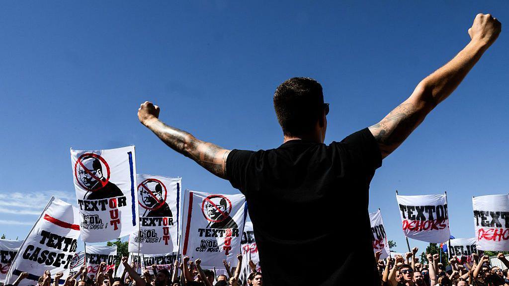 Lyon fans protest Textor's ownership