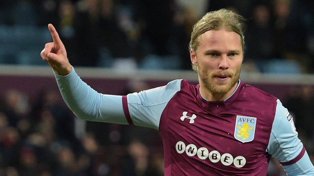 Aston Villa goalscorer Birkir Bjarnason celebrates