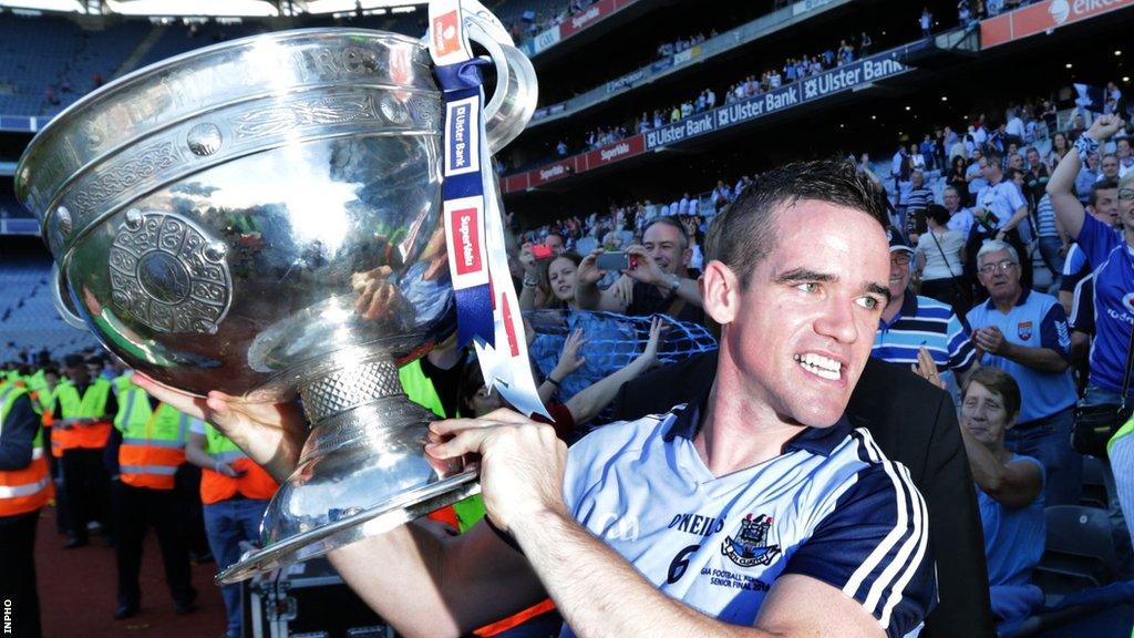 Ger Brennan holds the Sam Maguire Cup aloft after Dublin's victory over Mayo in the 2013 All-Ireland Final