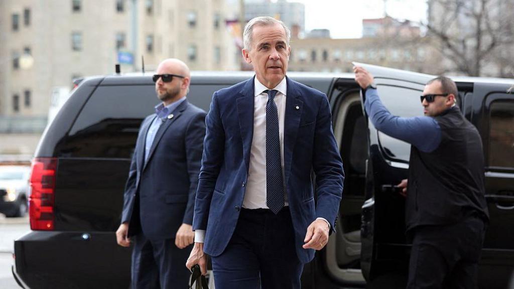 Canada's Prime Minister Mark Carney arrives at his office on Parliament Hill April 29, 2025 in Ottawa, Canada. Prime Minister Mark Carney pledged Tuesday to beat the United States in Donald Trump's trade war after winning Canada's election and leading his Liberal Party to another term in power.