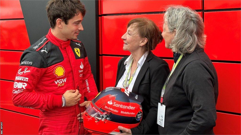 Charles Leclerc talking to Joann Villeneuve and Melanie