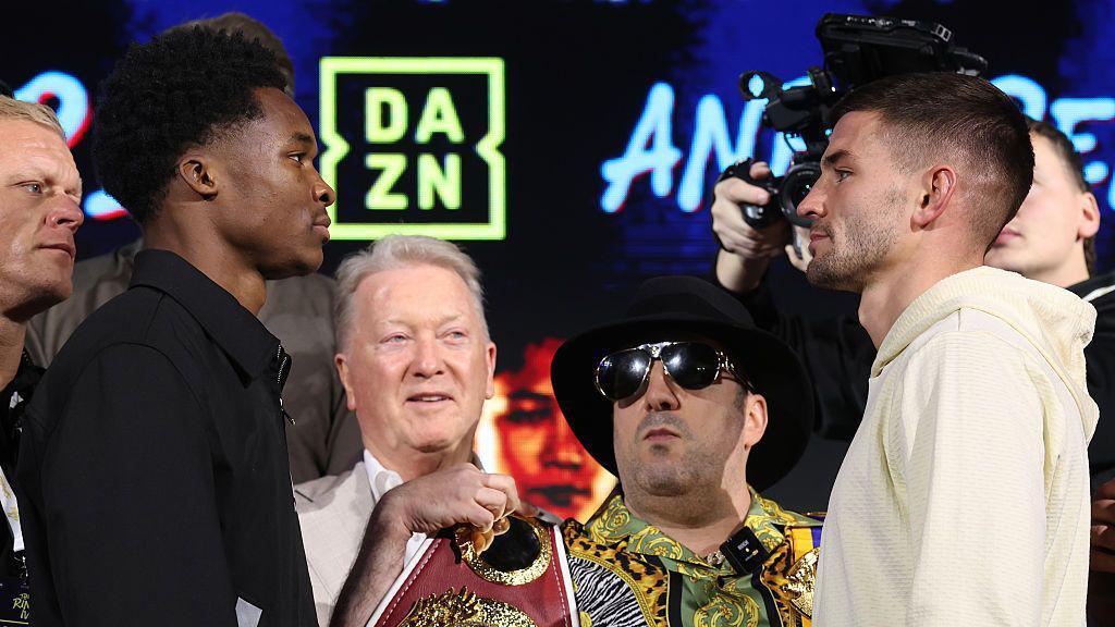 Abdullah Mason faces off with Sam Noakes at a news conference