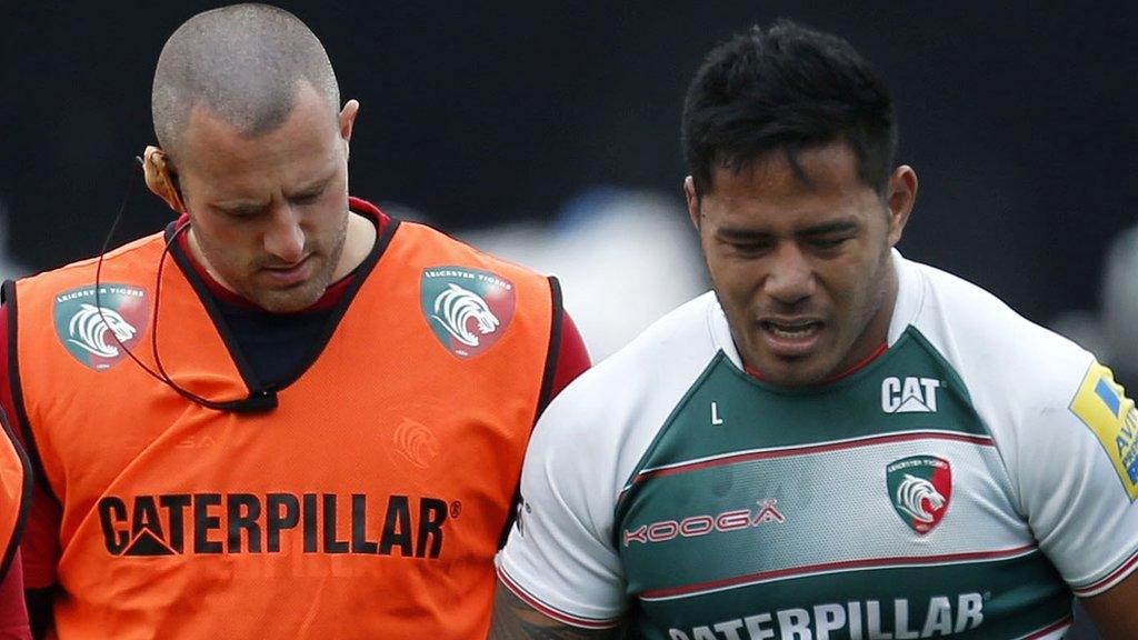 Man Tuilagi is helped off the pitch after injuring his hamstring