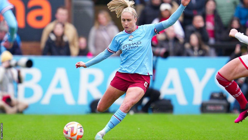 Steph Houghton takes a kick v Arsenal in the Women's Super League