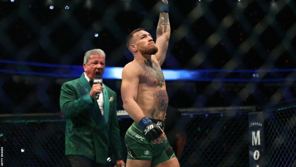 Conor McGregor is announced the cage by Bruce Buffer