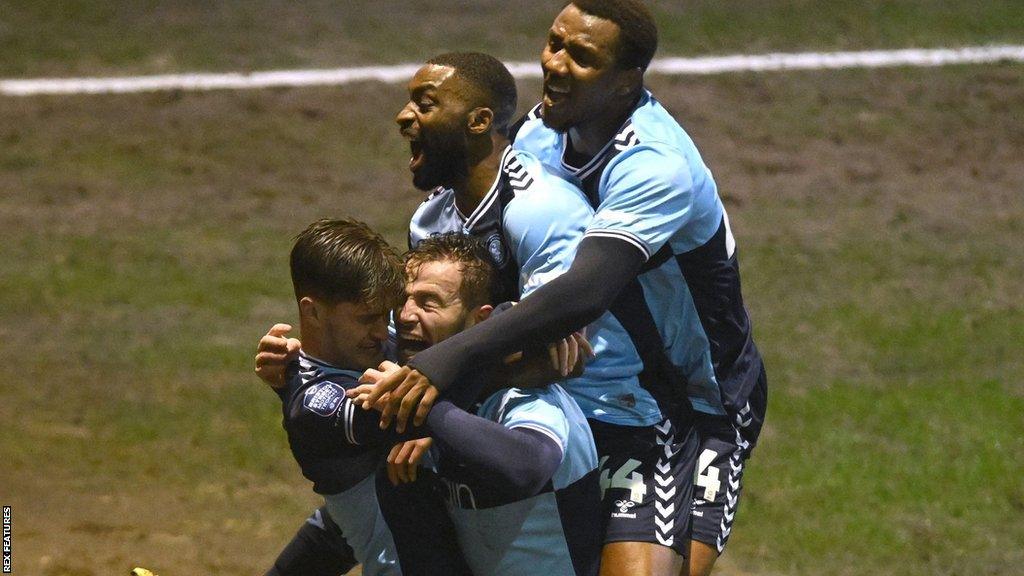 Wycombe players celebrate