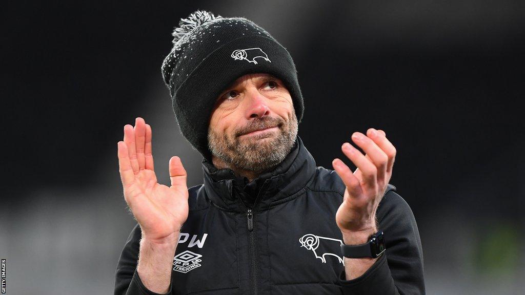 Derby County boss Paul Warne claps to his club's fans