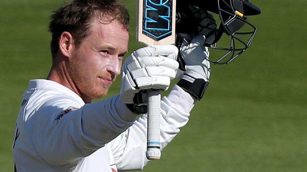 Tom Westley raises his bat