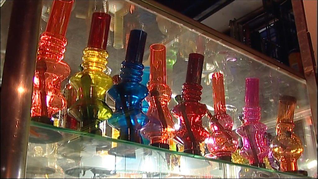 A row of bongs in a head shop