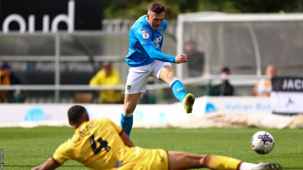 Macaulay Langstaff shoots towards goal for Notts County in the League Two game against Sutton United