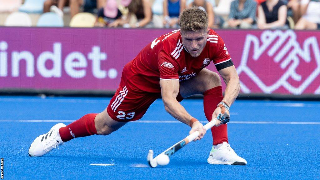 Nick Bandurak strikes a penalty corner for England