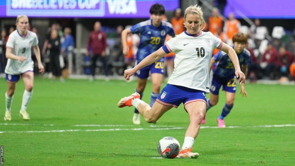 USA's Lindsey Horan scores a penalty against Japan