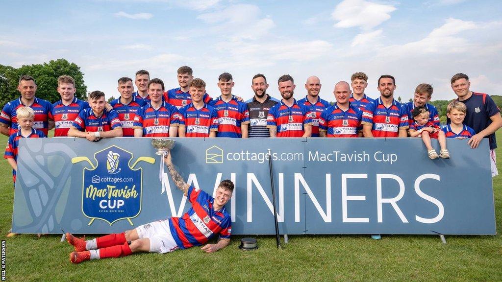 Kingussie celebrate their latest trophy