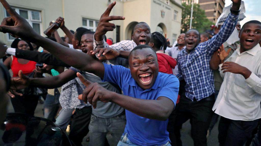 People celebrating in Harare, Zimbabwe