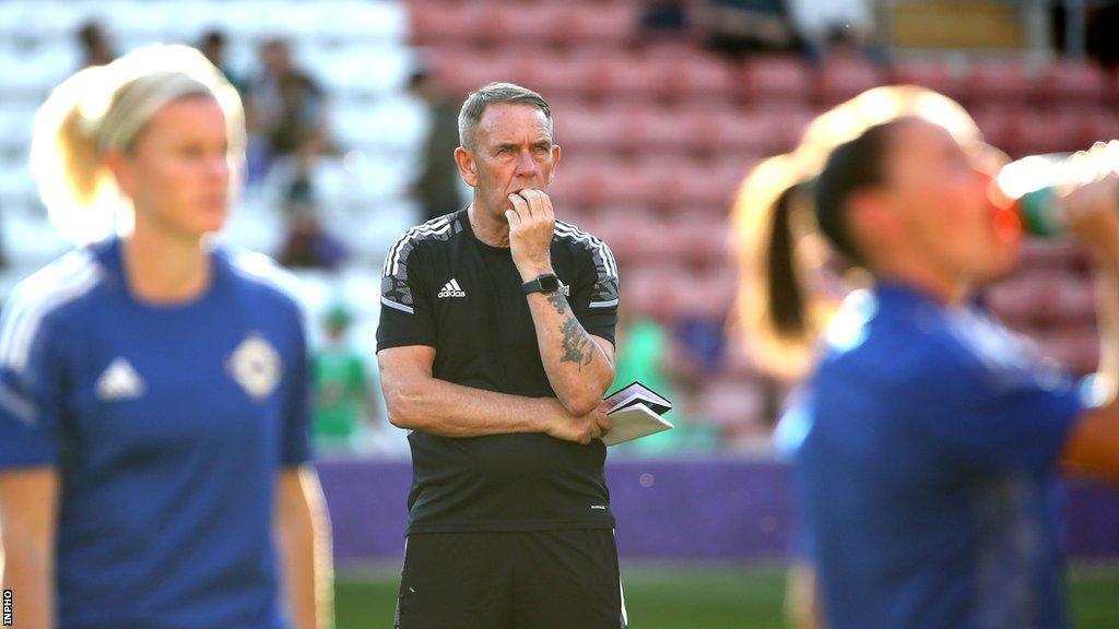 Kenny Shiels watches on during a Northern Ireland training session at Euro 2022