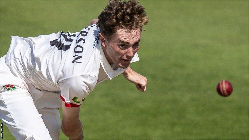 George Balderson bowls for Lancashire in a Championship game