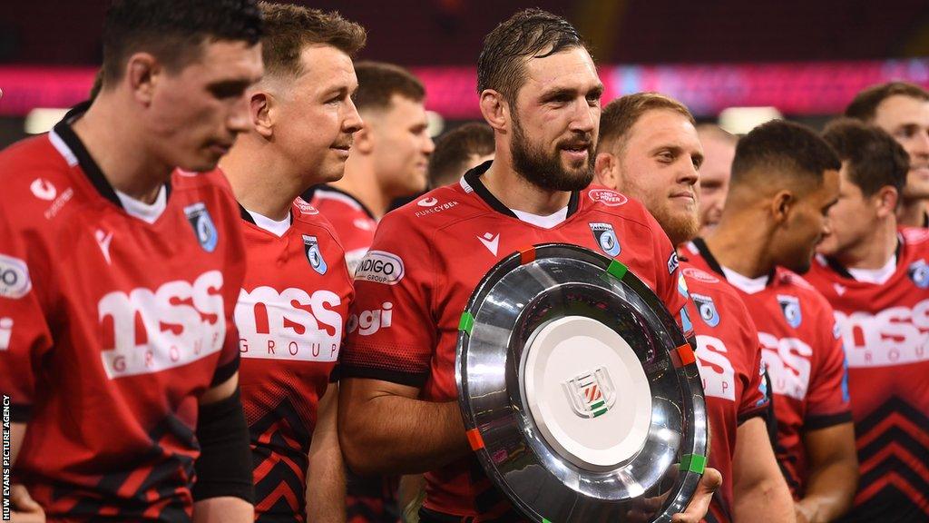 Cardiff captain Josh Turnbull with the URC Welsh shield as the region are rewarded for finishing as the highest Welsh side in the tournament