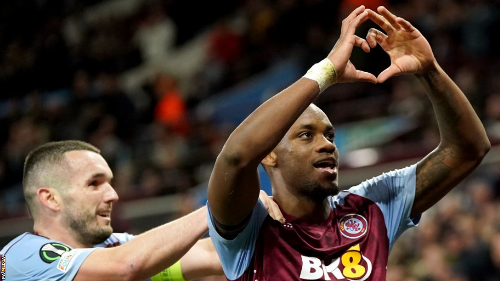 John McGinn and goalscorer Jhon Duran