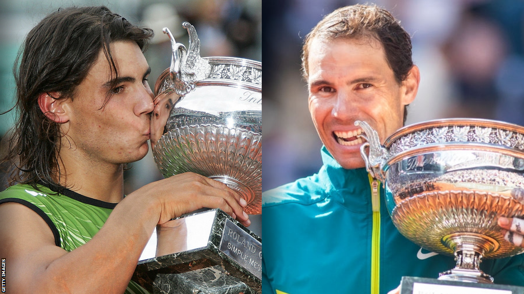 Rafael Nadal with the 2005 and 2022 French Open trophies