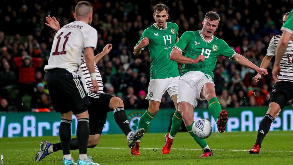 Evan Ferguson fires in his first international goal against Latvia in March