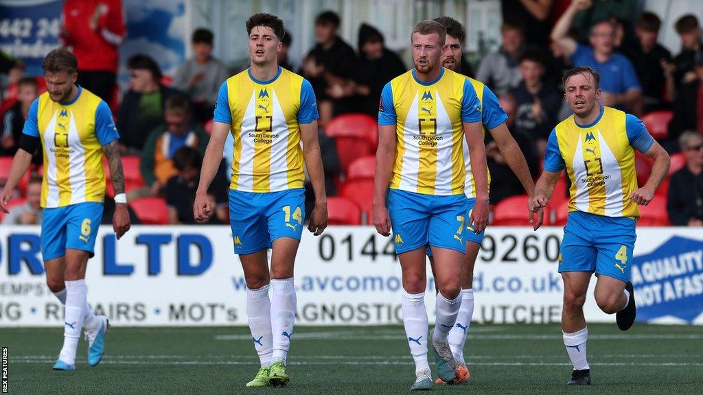 Dejected Torquay United players