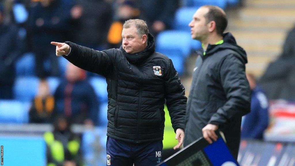 Coventry manager Mark Robins on the touchline