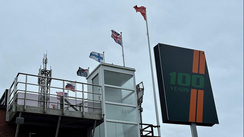 MGP 100 sign at grandstand