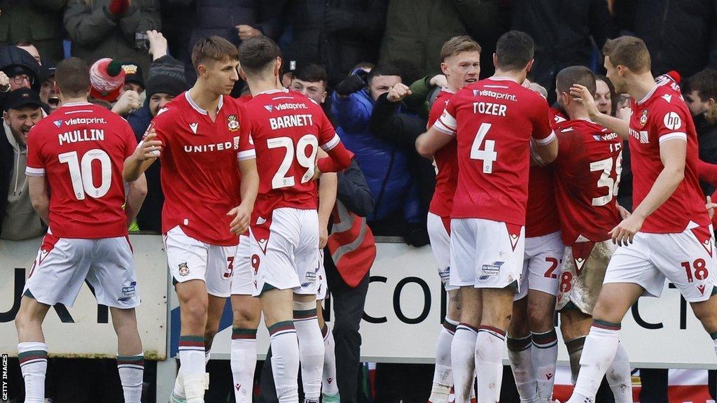 Wrexham celebrate Tom O'Connor's goal