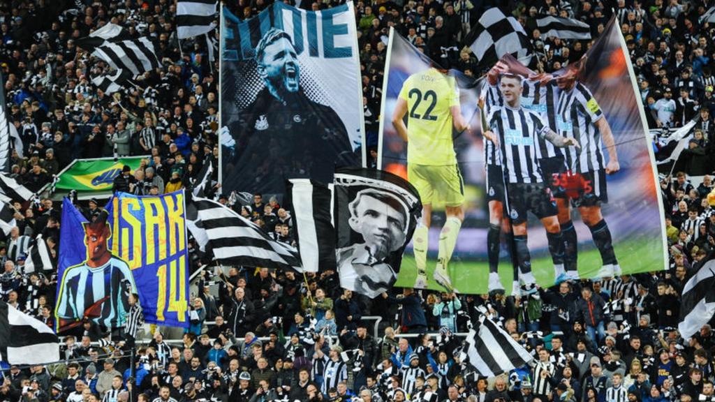 Newcastle fans hold fags at St James' Park