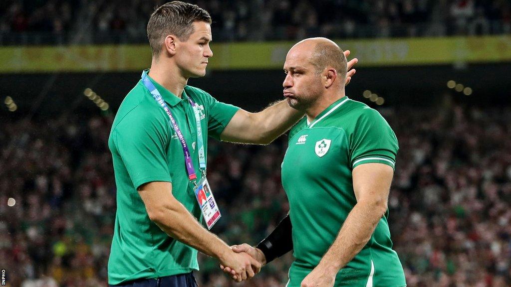 Injured Johnny Sexton consoles captain Rory Best after the shock defeat by Japan at the 2019 World Cup