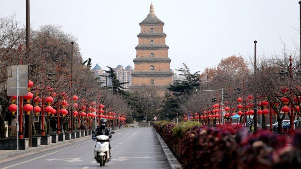 Delivery rider on the streets of Xi'an